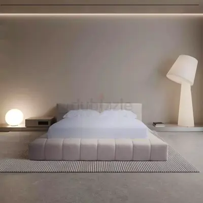 Low-profile upholstered platform bed with headboard (modern, light beige)