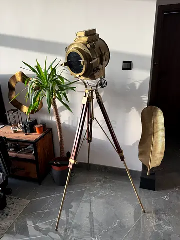 Industrial tripod floor lamp with nautical spotlight studio light