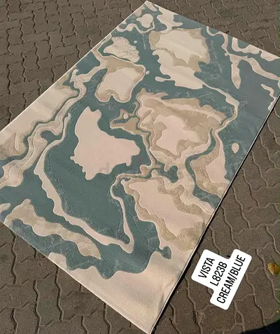 Modern abstract cream  blue area rug - good condition