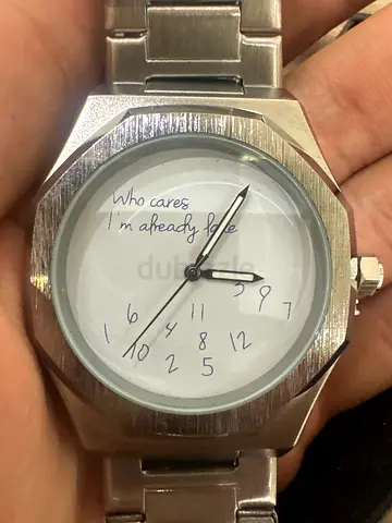 Silver metal wrist watch with white dial - preowned