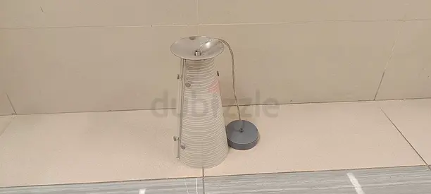 Single modern table lamp with cone-shaped frosted shade