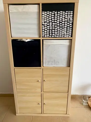 Ikea-style 8-cube storage shelf with fabric bins - light wood