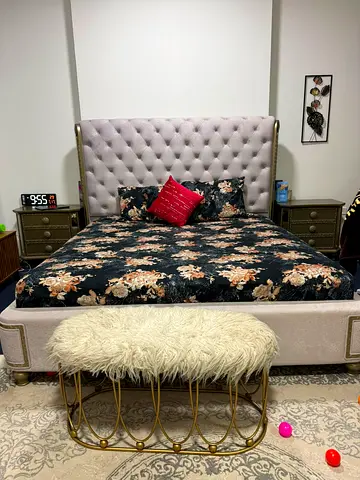 Queen tufted upholstered bed with bedside tables and bench