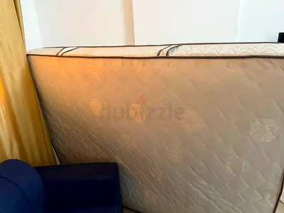 Queen mattress in good condition — firm, lightly used