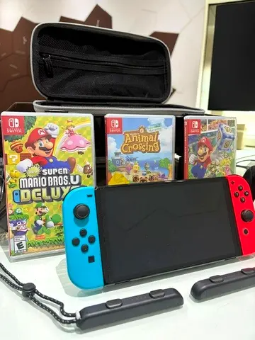 Nintendo Switch Bundle + Pro Controller + 3 Games + Carry Case