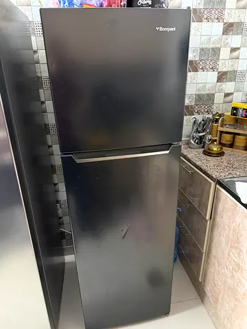 Black single-door refrigerator in good working condition