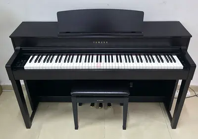 The Yamaha CLP-545 R (Dark Rosewood finish) is an advanced digital piano featuring the flagship