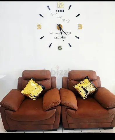 Pair of Brown faux Leather Armchairs ,same shape same shape as purchased ,condition 9/10