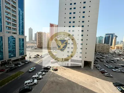 **Spacious Studio Apartment for Annual Rent | Al Majaz 2, Sharjah. Large space, central AC, free maintenance, modern building, and close to Dubai Exit