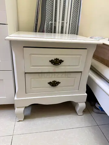White wooden bedside table with two drawers - good condition