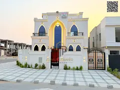 New corner villa with a full stone facade and central air conditioning in a prestigious residential