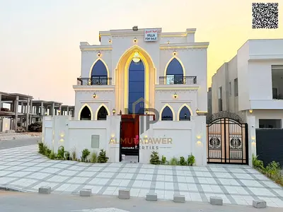 New corner villa with a full stone facade and central air conditioning in a prestigious residential area | Includes registration and ownership fees |