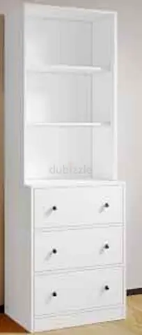 Ehite IKEA HAUGA storage combination features three drawers and open shelving.