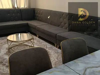 Two bedrooms and a living room / Furnished with hotel-style furniture / Al Taawun