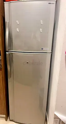Silver double-door refrigerator - good working condition