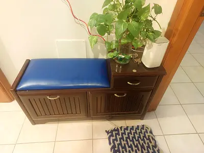 Wooden hallway shoe rack with storage and cushioned seat