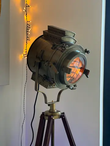 Industrial tripod floor lamp with nautical spotlight studio light