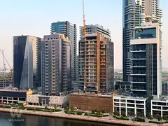 Canal and Burj Khalifa View | High floor |2BR+Maid