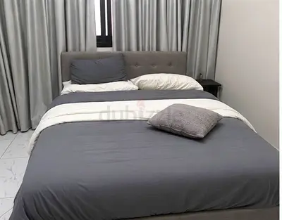 Bed queen bed gray color hydraulic with storage 6 month use for urgent sell