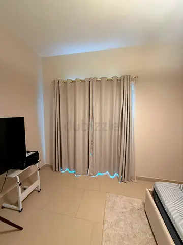 Light beige blackout eyelet curtains - set of panels