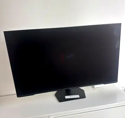 Samsung S43CG700NMXUE 43-inch LED computer monitor with its stand