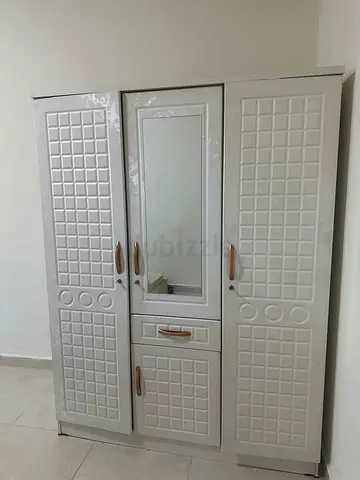 Three door cupboard for sale