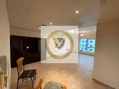 2BR apartment in Al Majaz 2 with free AC, gym, swimming pool, and kids' play area. Prime locatio