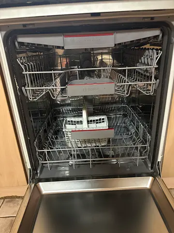 Stainless steel built-in dishwasher in good working condition