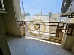 Spacious 2-bedroom apartment in Abu Shagara with modern finishes, open-view balcony, ideal for shari