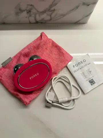 Foreo Bear facial toning device with charger and pouch. Brand new. 5 levels of power