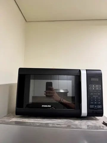 Compact Nikai Microwave Oven - Good Working Condition