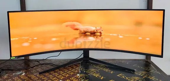 The Samsung Odyssey G9 QLED is a massive 49-inch super ultra-wide curved gaming monitor. Featuring