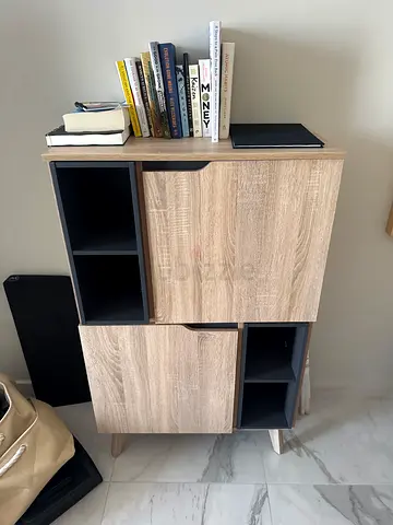 Compact wooden cabinet with cubby shelves and two doors - light oak finish