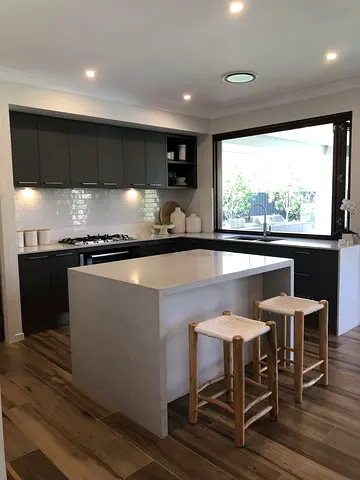 Luxury Waterfall Quartz Kitchen Island – Custom Built Modern Island Counter with Engineered Stone