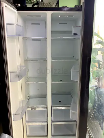Commercial upright display freezer with sliding glass doors - good condition