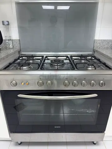 Bosch stainless steel 5-burner gas range with oven - good condition