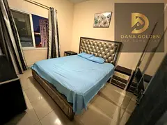 Two bedrooms, a living room, two bathrooms, a balcony, and internet are available for rent in the Al