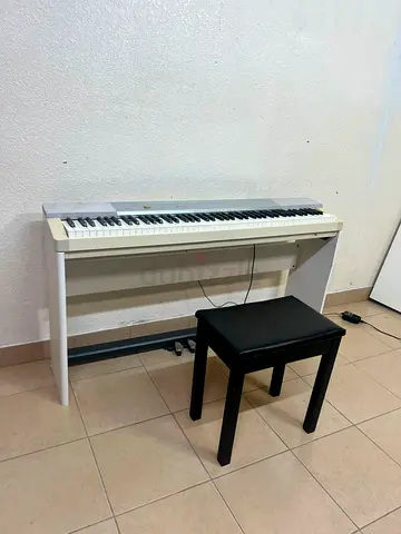 Used digital piano with stand and bench - 88 keys