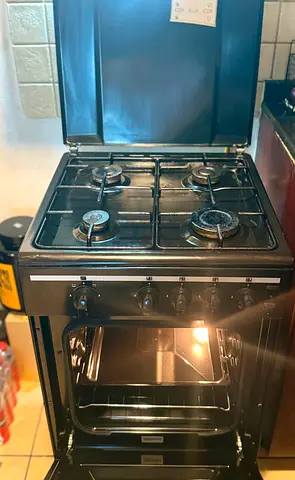 Used 4-Burner Gas Cooker with Oven - Good Working Condition