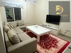 Furnished one-bedroom apartment with living room, two bathrooms, and two balconies for rent in Al Ta