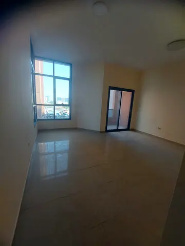 Al Nuaimia Towers: Spacious 1 Bedroom Hall Apartment with Balcony Available for Rent