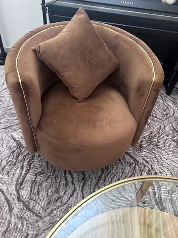 Brown velvet swivel accent chair with cushion
