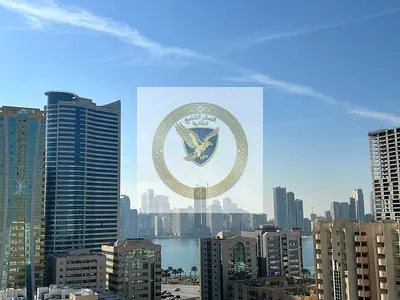 2BR apartment with living room, free A/C and free parking. Prime location near cafés, shops, all amenities, and easy access to Dubai exit.