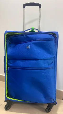 United Colors of Benetton , Blue soft-shell trolley suitcase with wheels - medium size