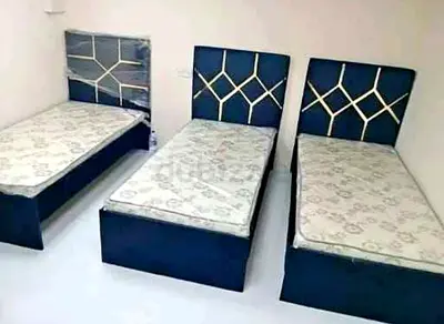 Modern Single Beds with Navy Blue Upholstered Headboards