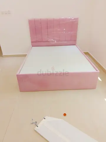 Pink upholstered double bed frame with headboard - like new