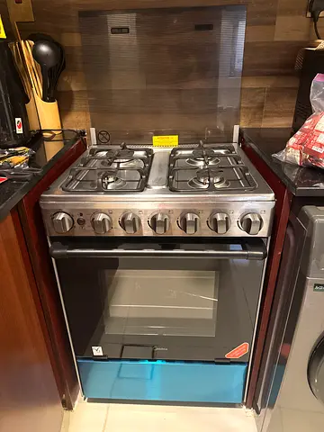Used freestanding gas oven and stove combo — good working condition