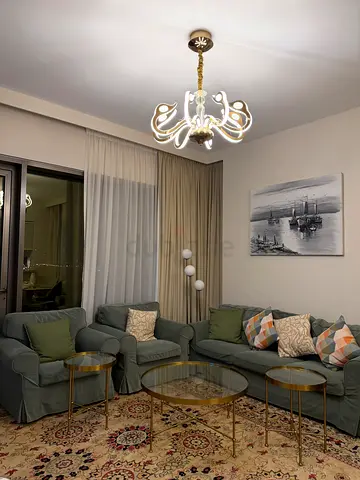 Used 3-piece upholstered sofa set with glass side tables and beautiful light