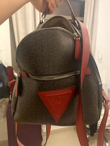 Small GUESS monogram backpack in brown with red trim - gently used