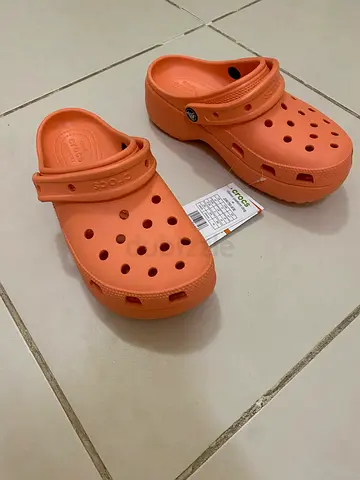 Like-new coral Crocs Classic Clog, size (check tag) - comfortable casual shoes
